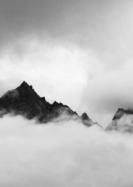 Mountain peaks shrouded in clouds